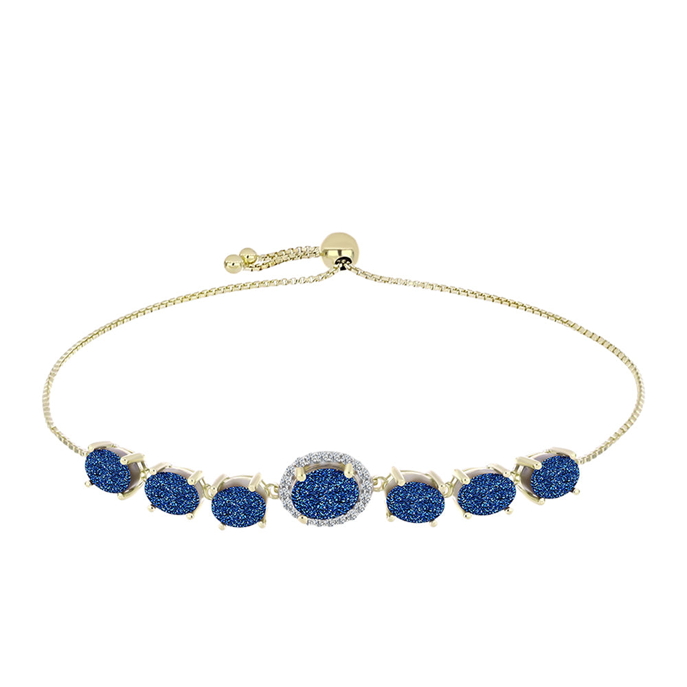 Goldplattiertes Silberarmband mit blauer Druse und weißem Topas