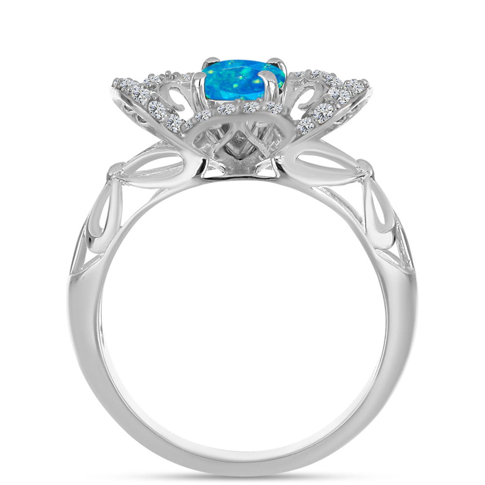 Silberring mit äthiopischem Paraiba-Blauopal und weißem Topas