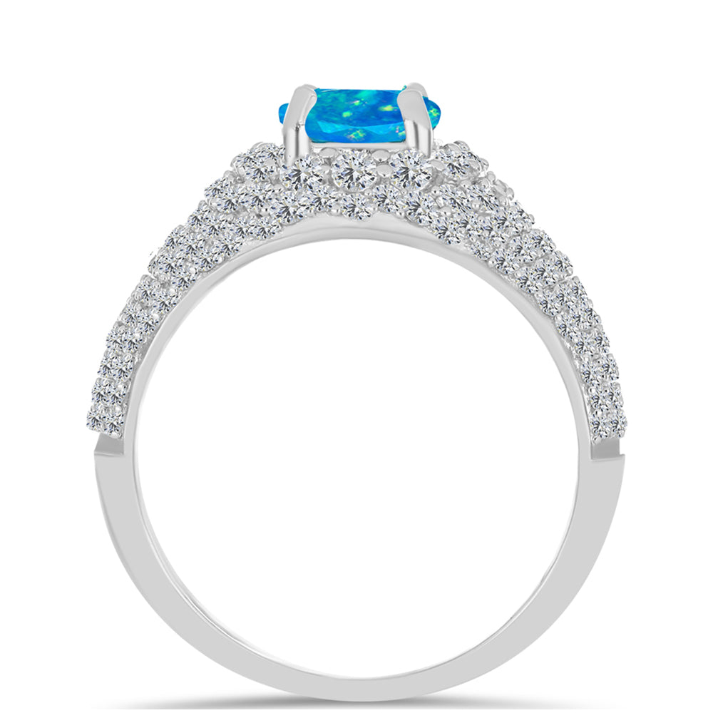 Silberring mit äthiopischem Paraiba-Blauopal und weißem Topas