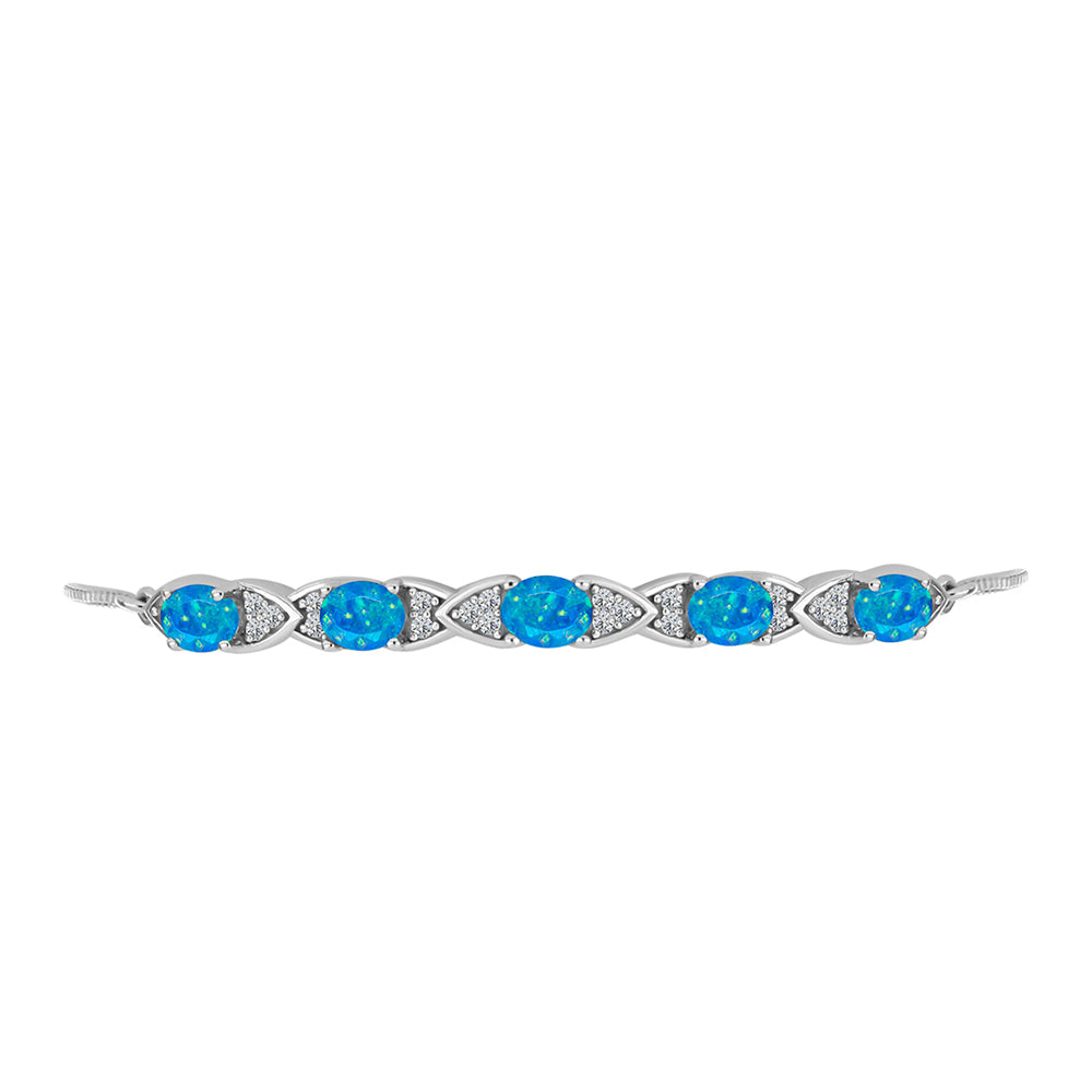 Silberarmband mit äthiopischem Paraiba-Blauopal und weißem Topas