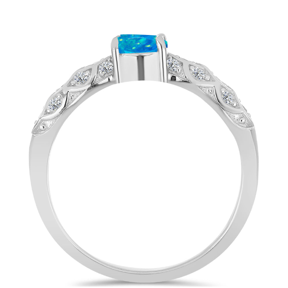 Silberring mit äthiopischem Paraiba-Blauopal und weißem Topas