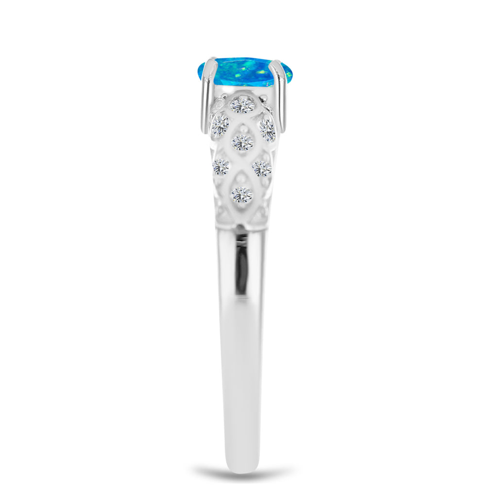 Silberring mit äthiopischem Paraiba-Blauopal und weißem Topas