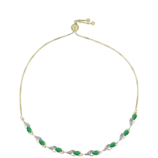 Goldplattiertes Silberarmband mit brasilianischem Smaragd und weißem Topas
