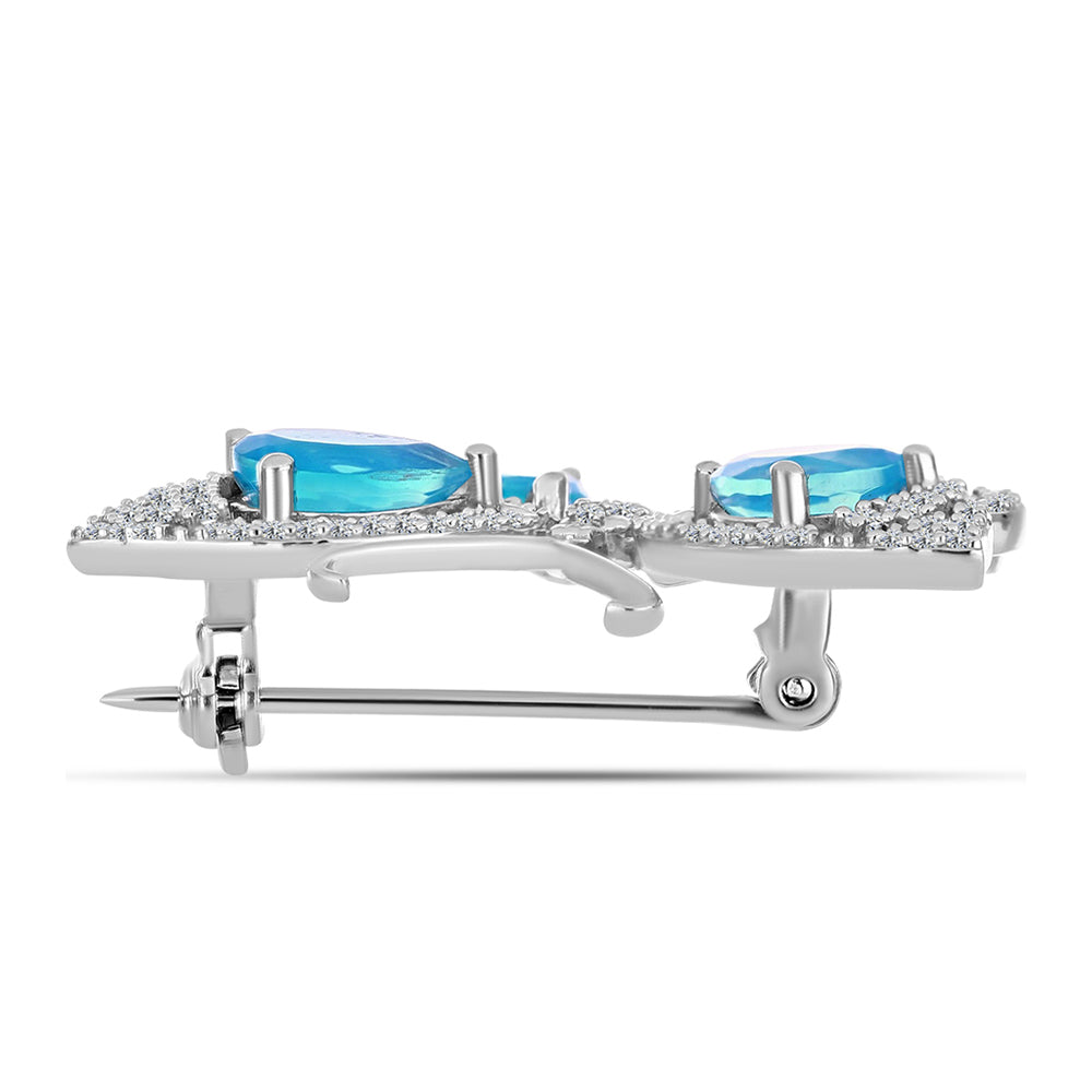 Silberbrosche mit äthiopischem blauem Paradise-Opal und weißem Topas