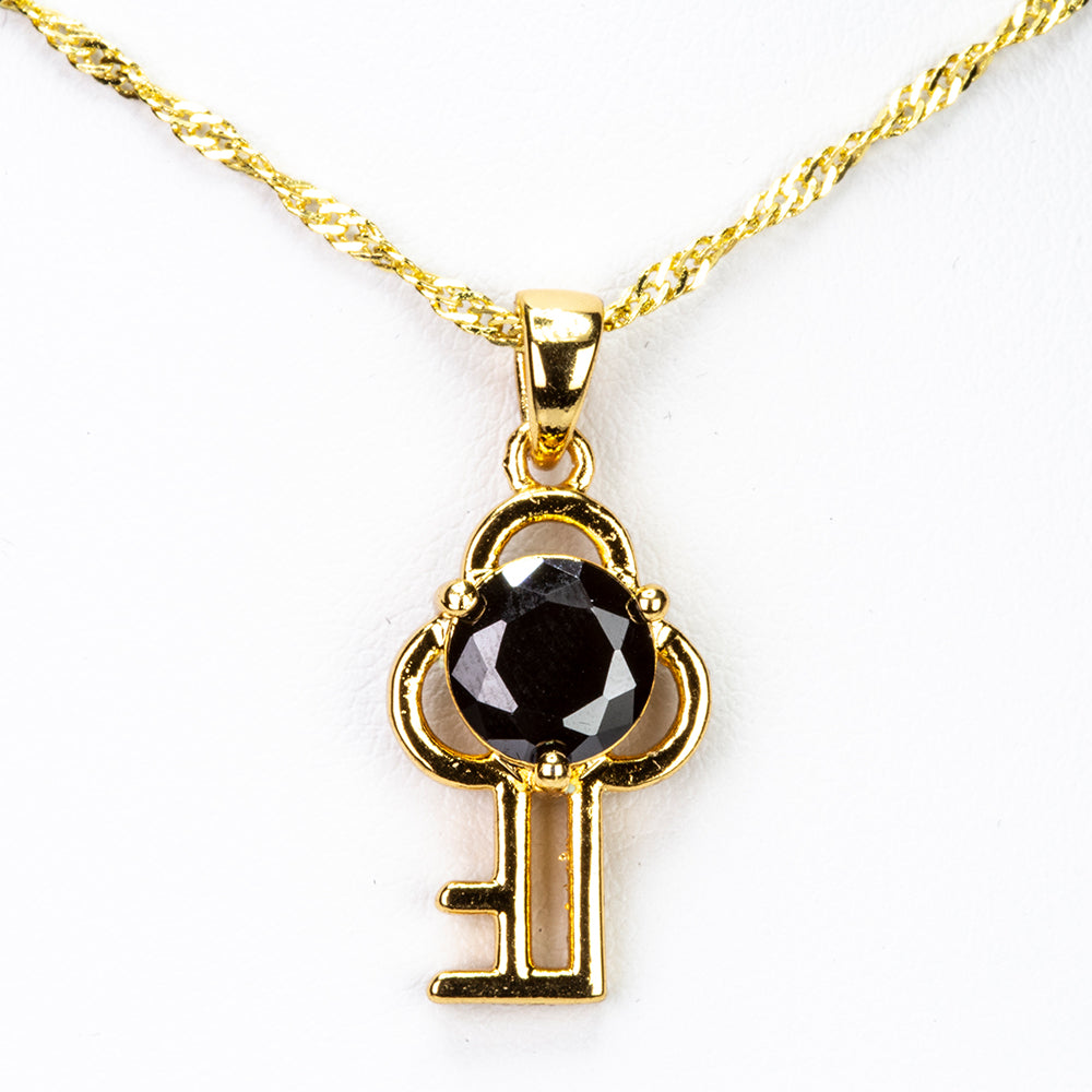 Schmuckgarnitur aus aus goldplattierter Legierung mit schwarzem Emporia®-Kristall 2 