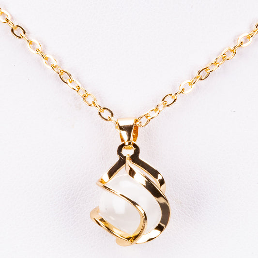 Schmuckgarnitur aus aus goldplattierter Legierung mit weißem Emporia® Kristall