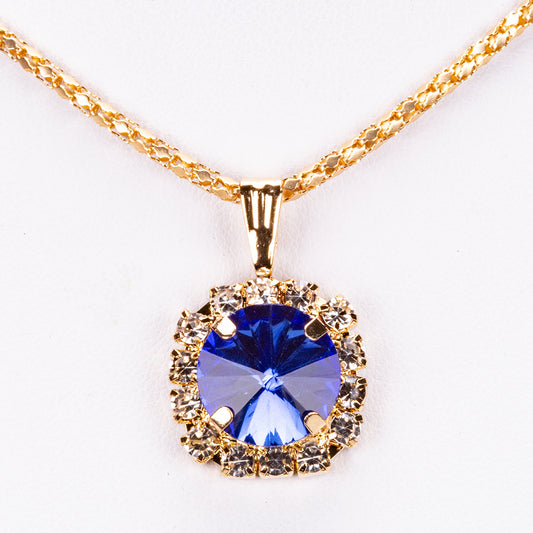 Schmuckgarnitur aus aus goldplattierter Legierung mit blauem Emporia®-Kristall