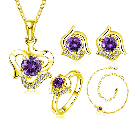 Schmuckgarnitur aus aus goldplattierter Legierung mit purpurfarbenem Emporia® Kristall