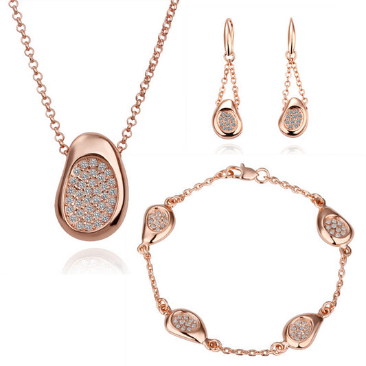 Schmuckgarnitur aus aus goldplattierter Legierung mit weißem Emporia® Kristall