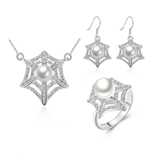 Schmuckgarnitur aus aus goldplattierter Legierung mit weißem Emporia® Kristall und Perle