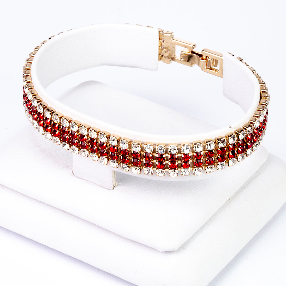 Uhr aus goldplattierter Legierung mit rotem Emporia®-Kristall 9 