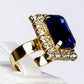 Schmuckgarnitur aus aus goldplattierter Legierung mit blauem Emporia®-Kristall und weißem Emporia® Kristall