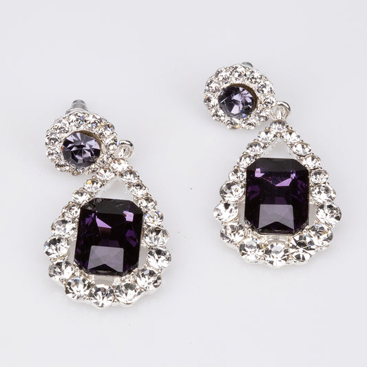 Schmuckgarnitur aus aus weißgoldplattierter Legierung mit purpurfarbenem Emporia® Kristall und weißem Emporia® Kristall