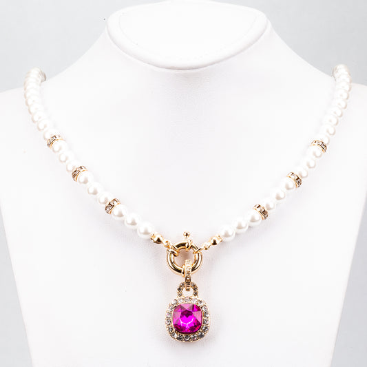 Schmuckgarnitur aus aus goldplattierter Legierung mit rotem Emporia®-Kristall und blauem Emporia®-Kristall