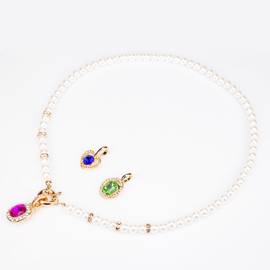 Schmuckgarnitur aus aus goldplattierter Legierung mit rotem Emporia®-Kristall und blauem Emporia®-Kristall