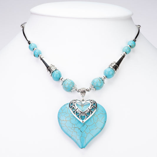 Schmuckgarnitur aus aus goldplattierter Legierung mit Türkis