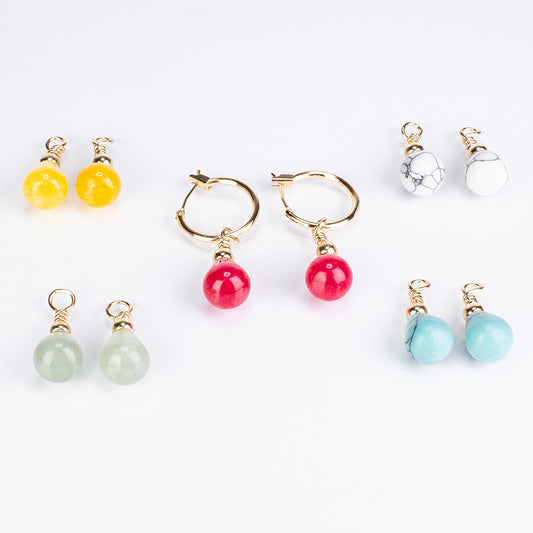 Schmuckgarnitur aus aus goldplattierter Legierung mit Türkis und Karneol