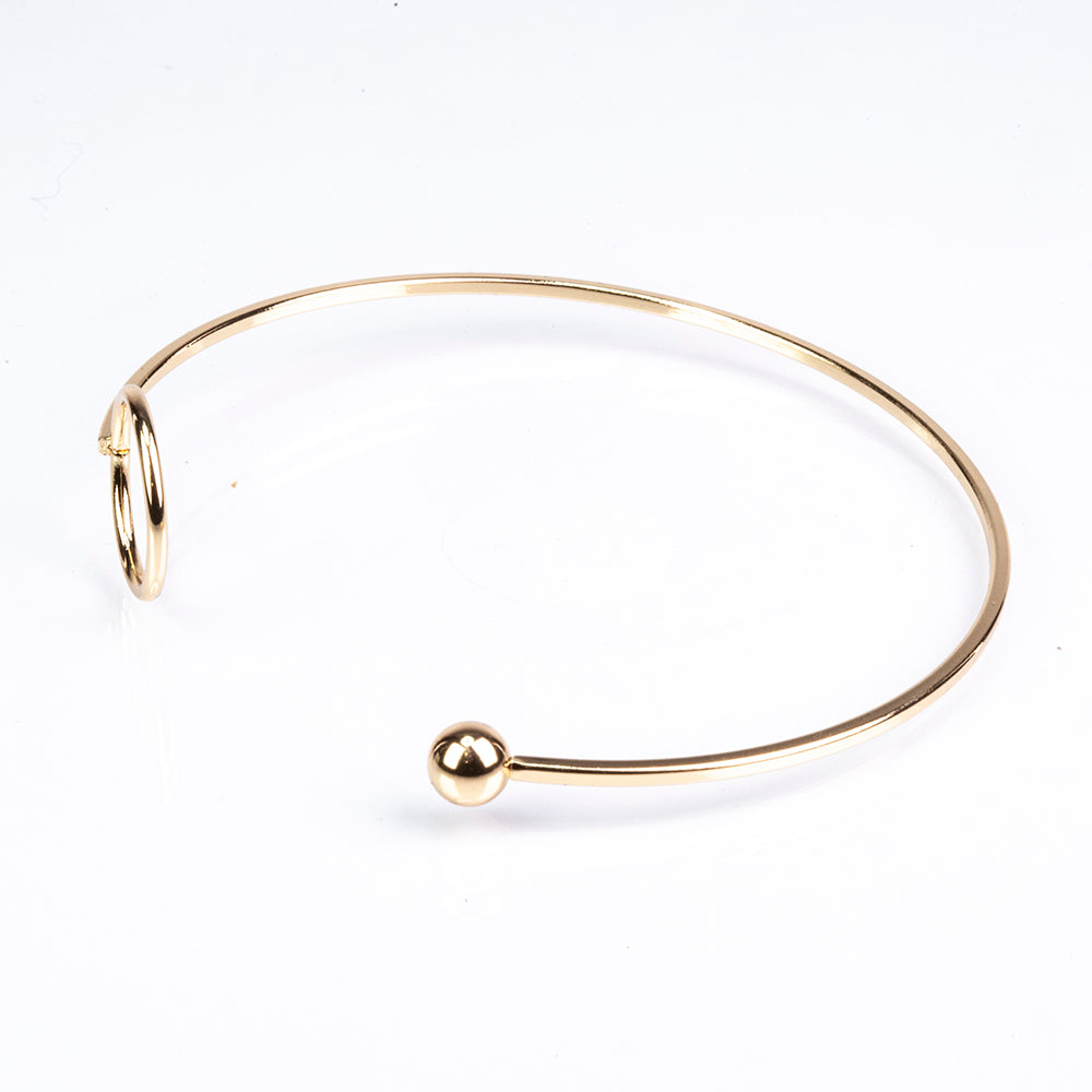 Schmuckgarnitur aus aus goldplattierter Legierung mit Emaille und rotem Emporia®-Kristall